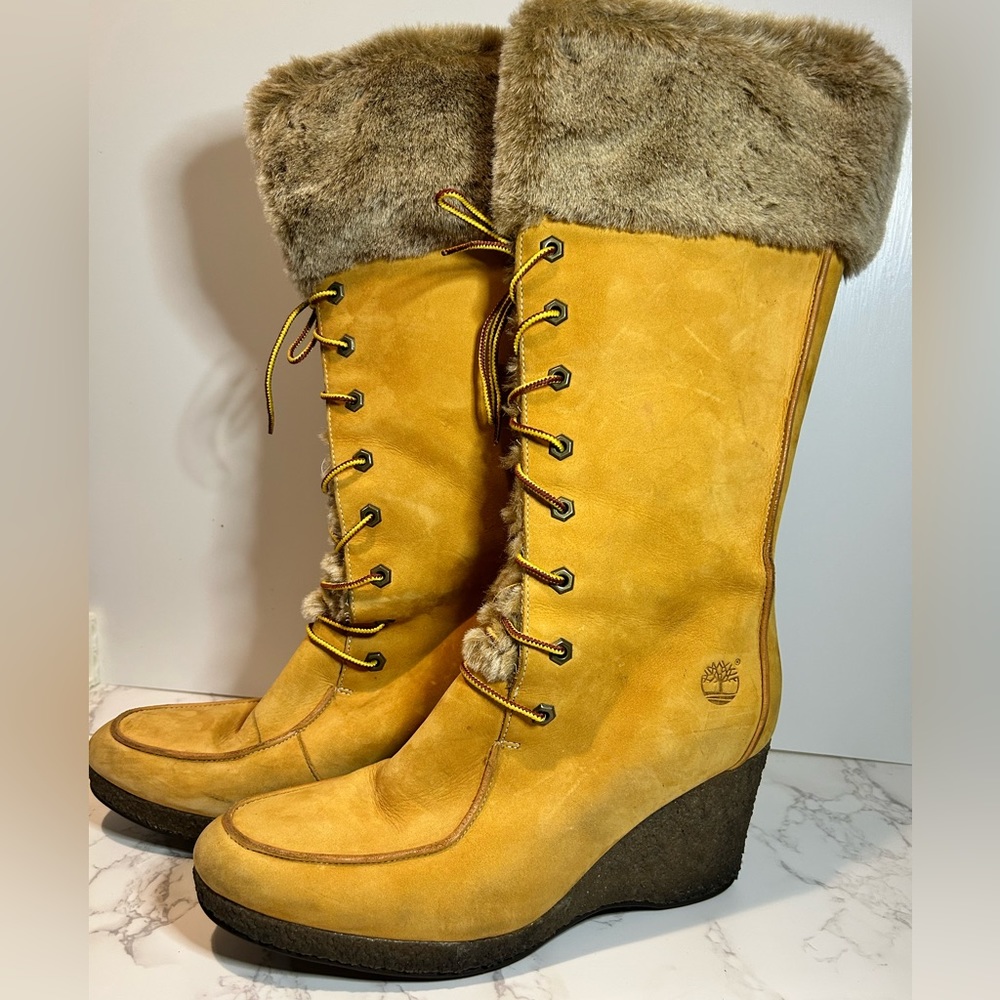 Timberland Laced up fur lined tall wedged Boots size 10M